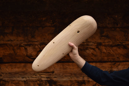 A carved elm sloper. Type of wood: elm. Dimensions(LxWxH): 58x16x11. Eco-friendly holds for modern indoor climbing.