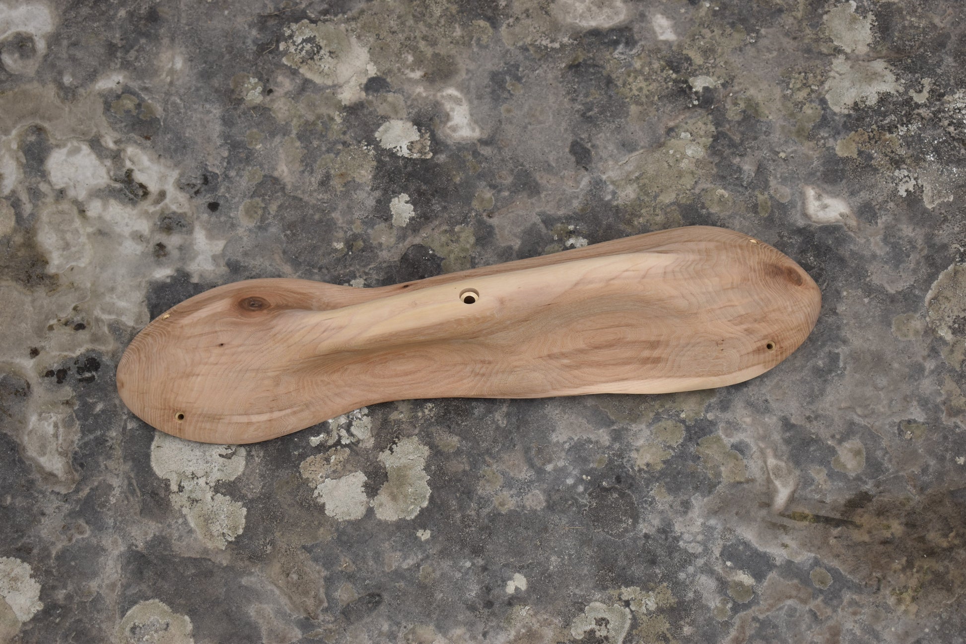 A carved elm pinch. Type of wood: elm. Dimensions(LxWxH): 69x17x9. Eco-friendly holds for modern indoor climbing.