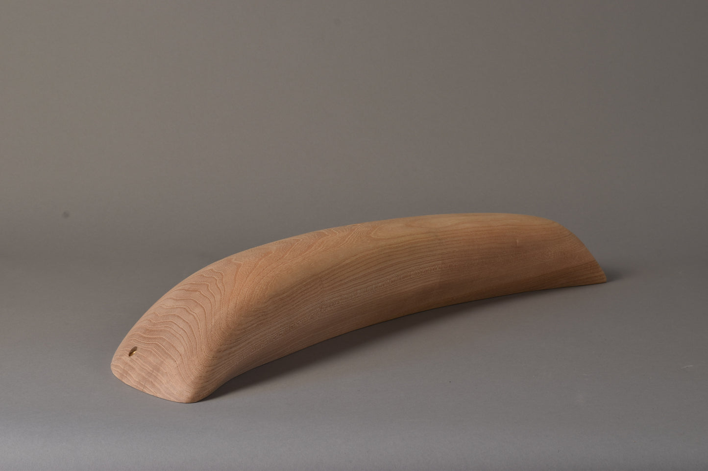 A carved elm sloper. Type of wood: elm. Dimensions(LxWxH): 70x23x10.5. Eco-friendly holds for modern indoor climbing.